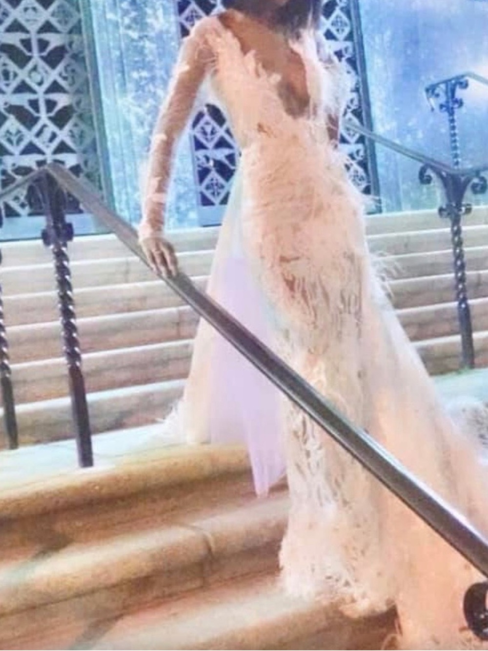 Elegant Feather-Embellished White Evening Gown